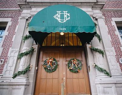 exterior doors to the University Club with festive wreaths.
